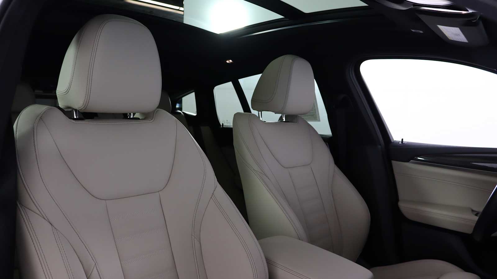 used 2023 BMW X4 car, priced at $56,698