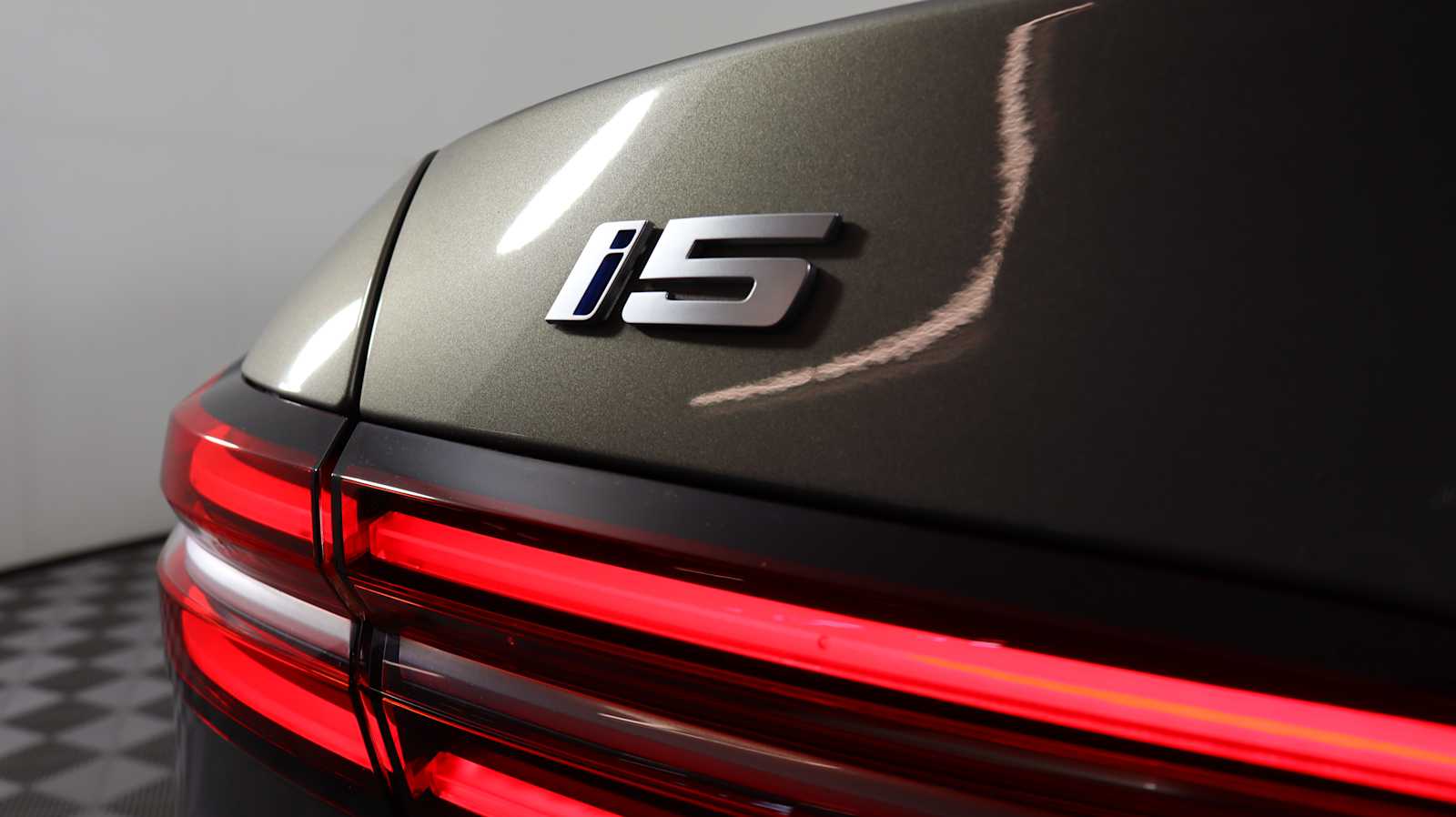 used 2024 BMW i5 car, priced at $48,657