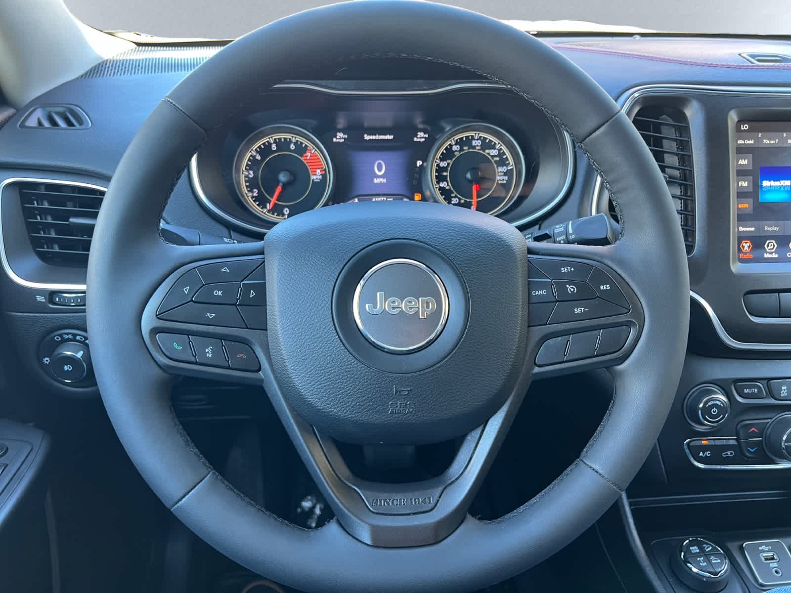 used 2021 Jeep Cherokee car, priced at $25,497