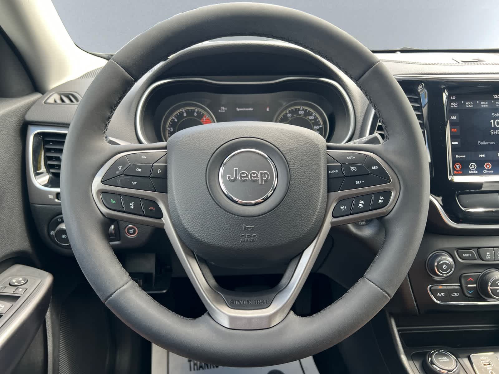 used 2022 Jeep Cherokee car, priced at $30,897