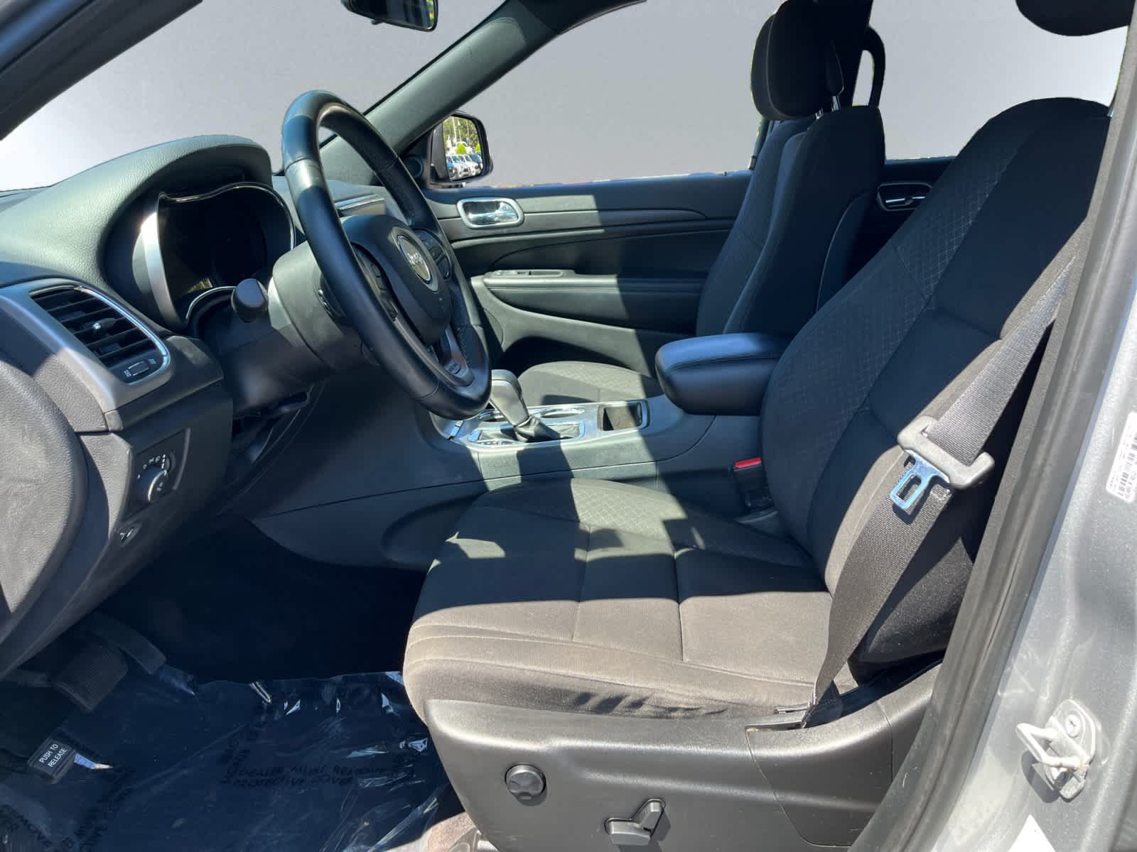 used 2018 Jeep Grand Cherokee car, priced at $14,487