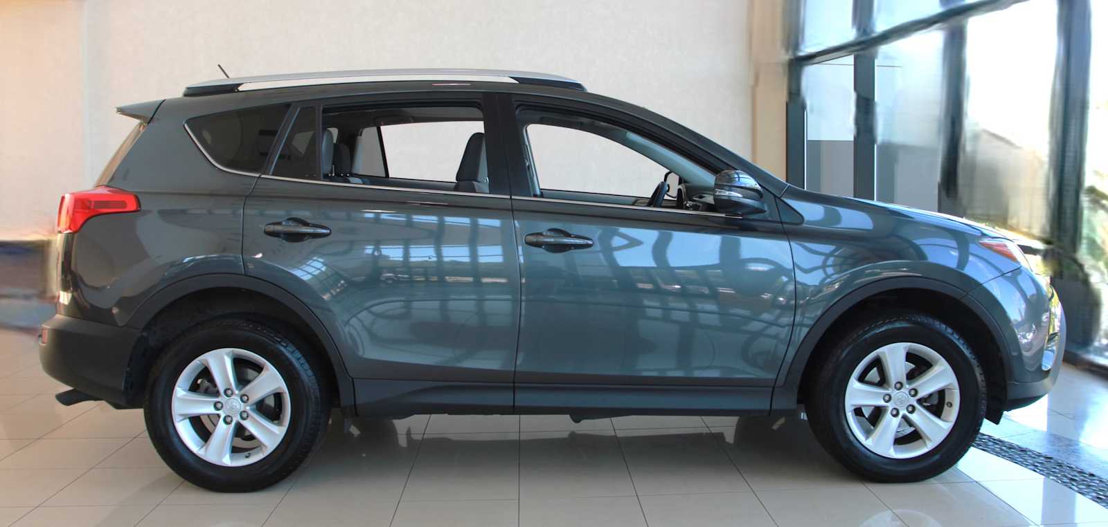 used 2013 Toyota RAV4 car, priced at $18,497