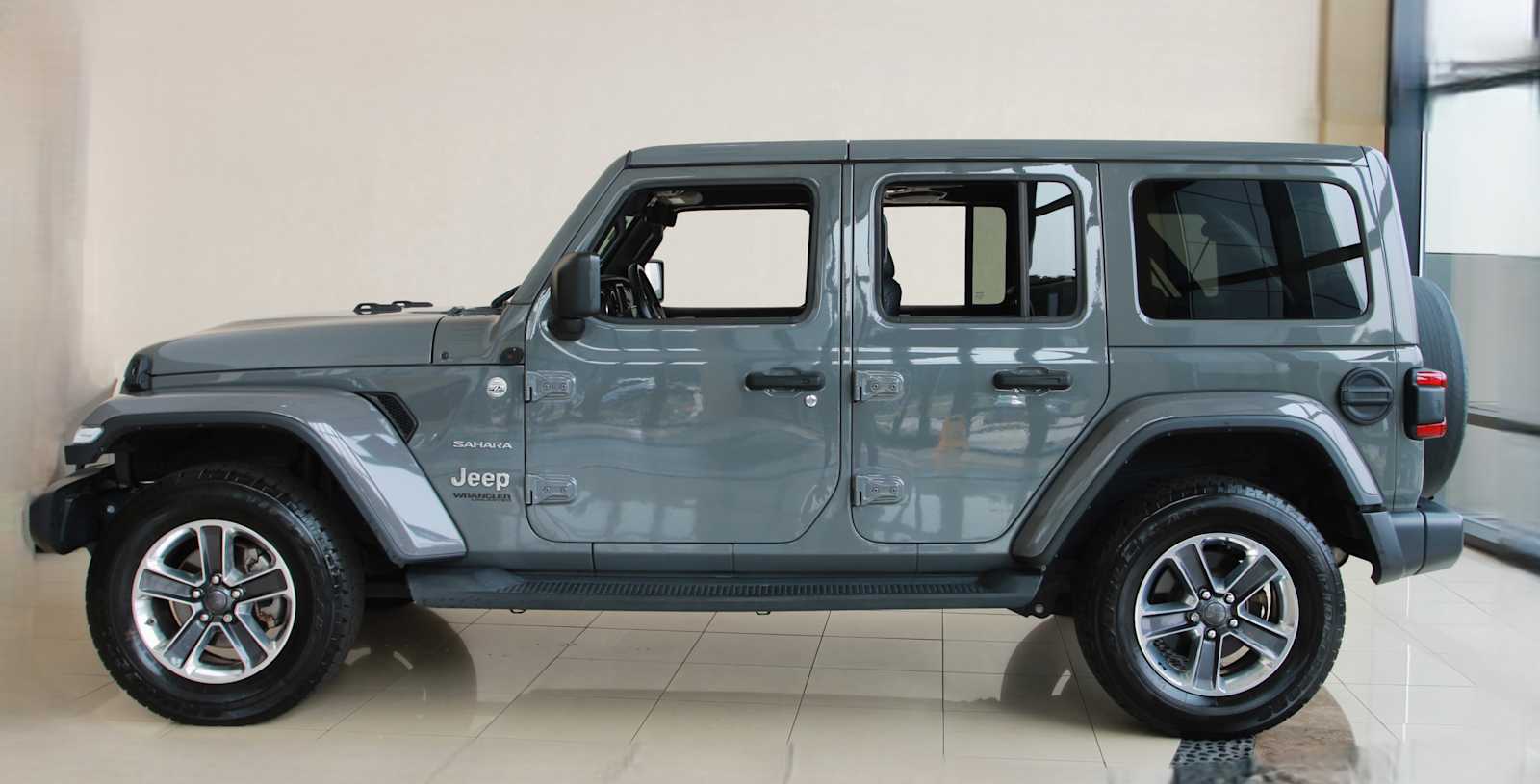 used 2019 Jeep Wrangler Unlimited car, priced at $23,598