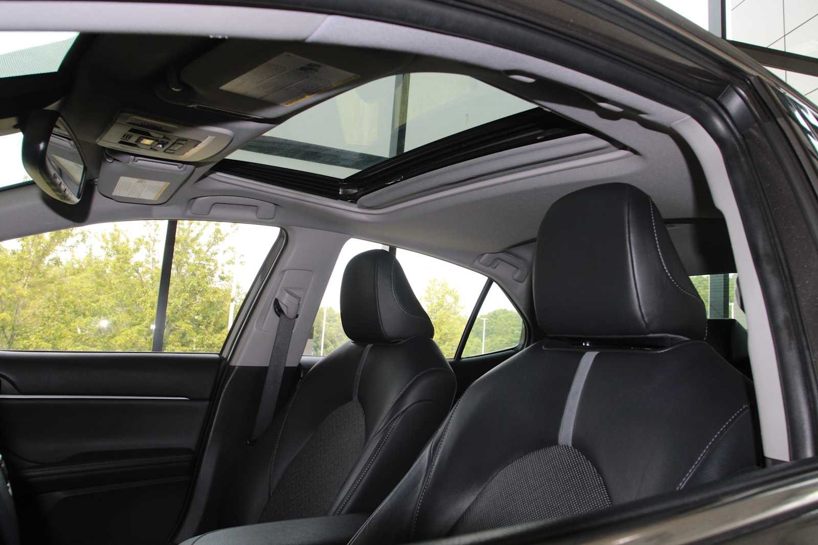 used 2021 Toyota Camry Hybrid car, priced at $28,297