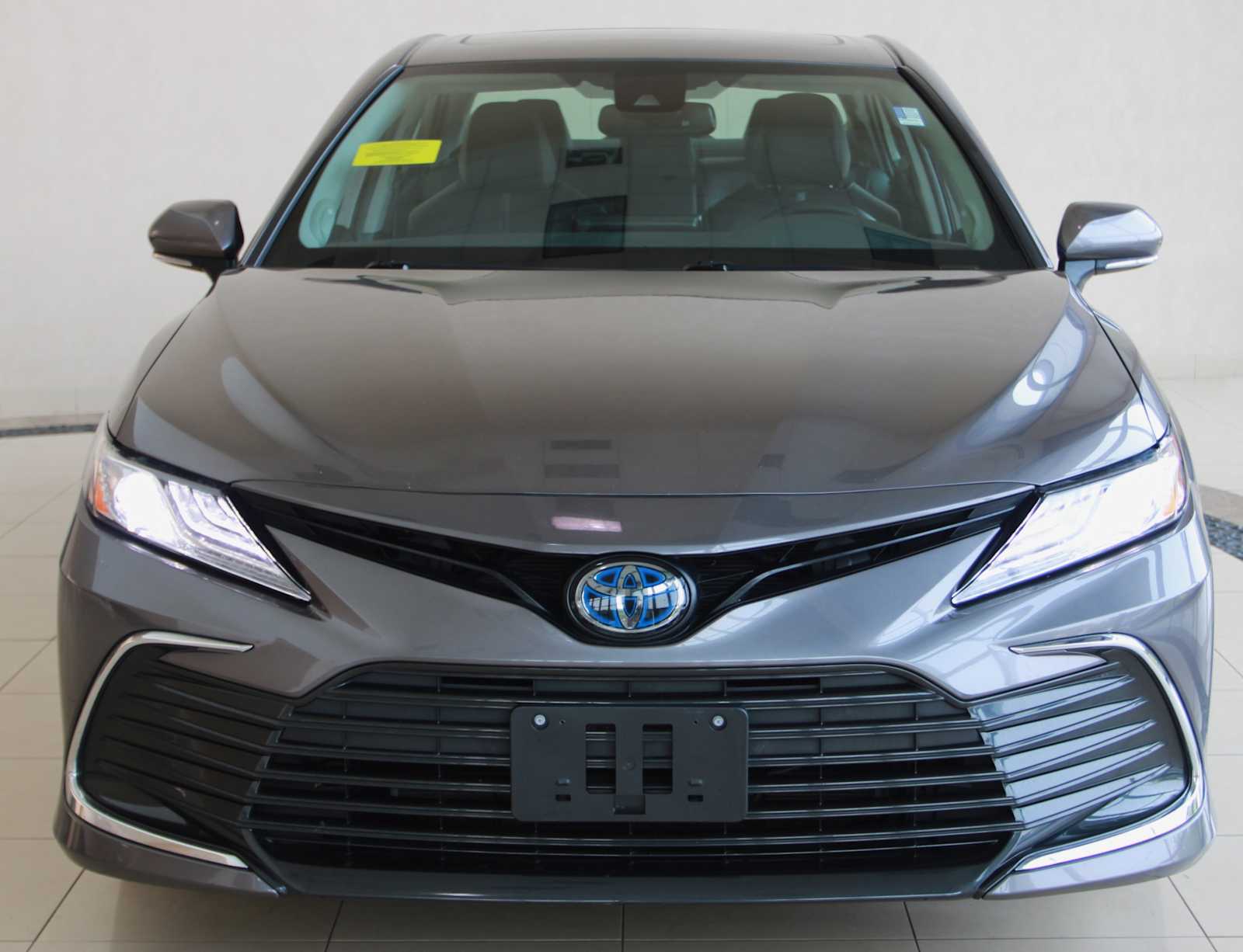used 2021 Toyota Camry Hybrid car, priced at $28,297