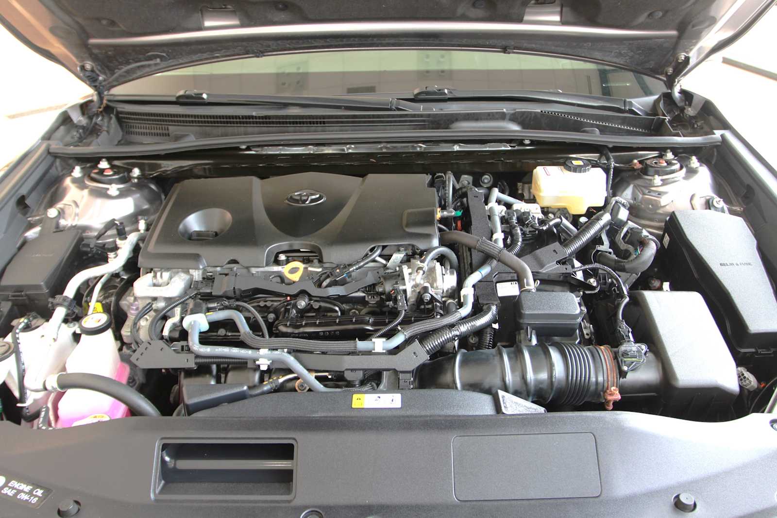 used 2021 Toyota Camry Hybrid car, priced at $28,297