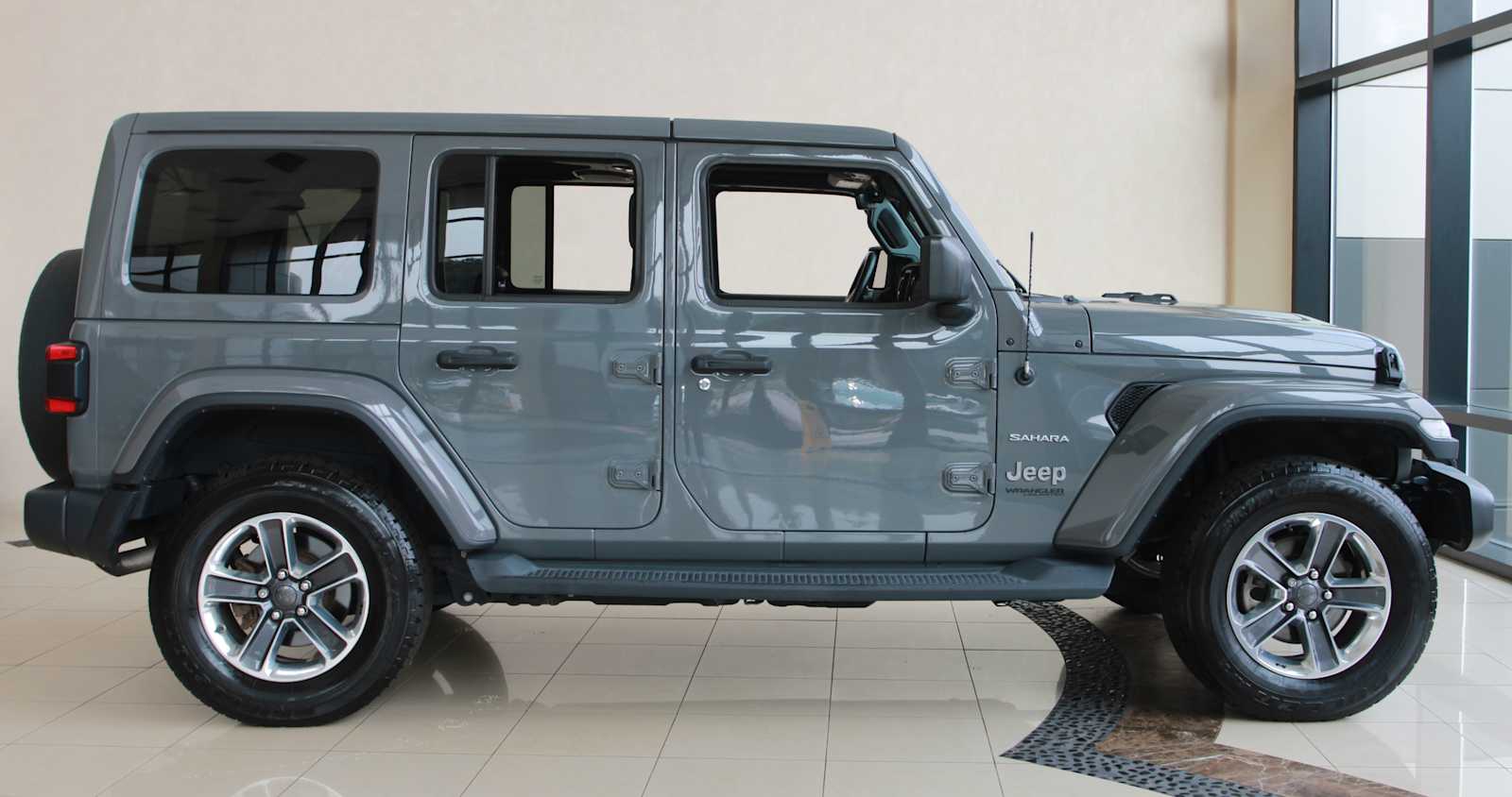 used 2019 Jeep Wrangler Unlimited car, priced at $23,598