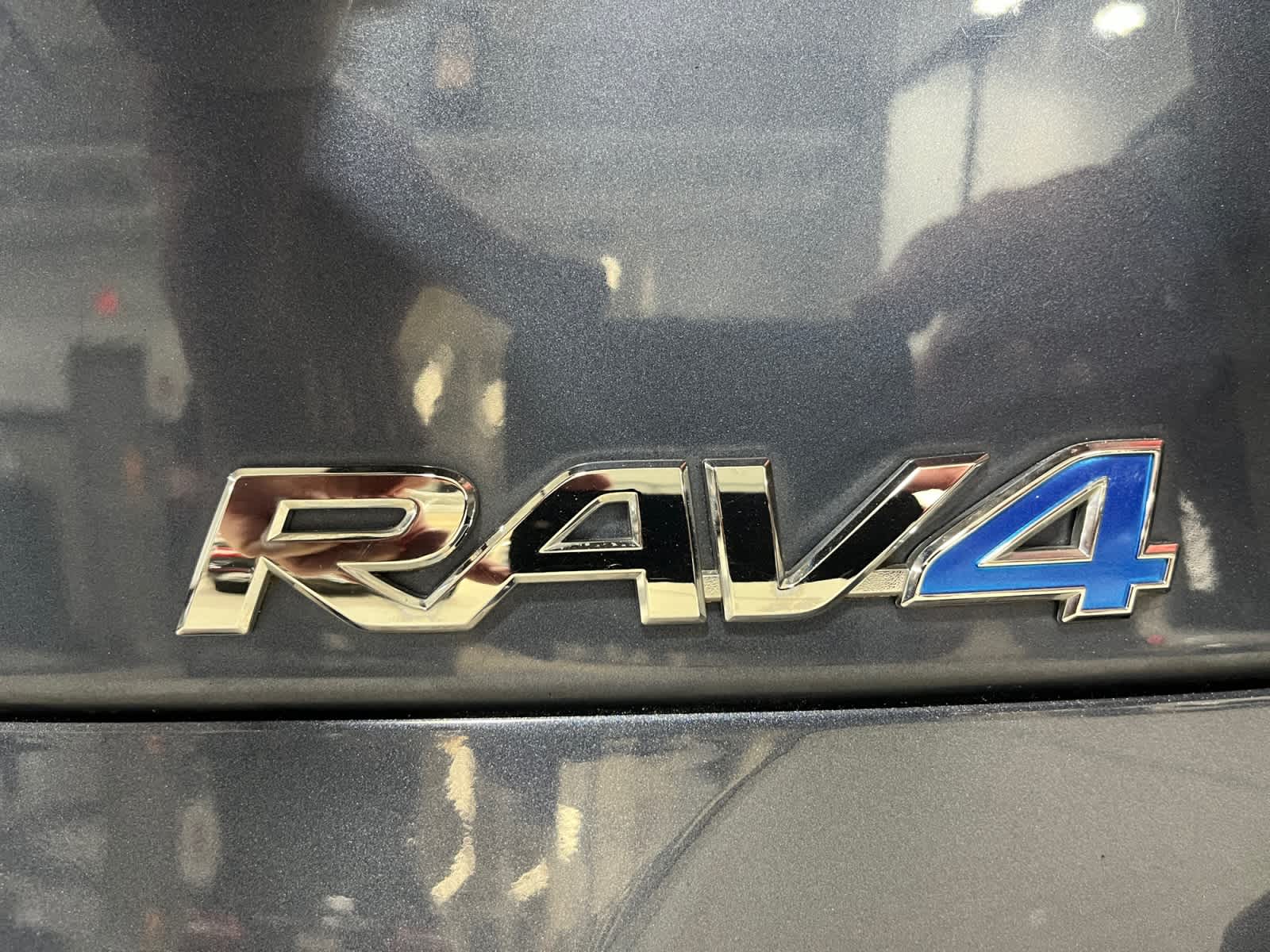 used 2014 Toyota RAV4 EV car, priced at $9,987