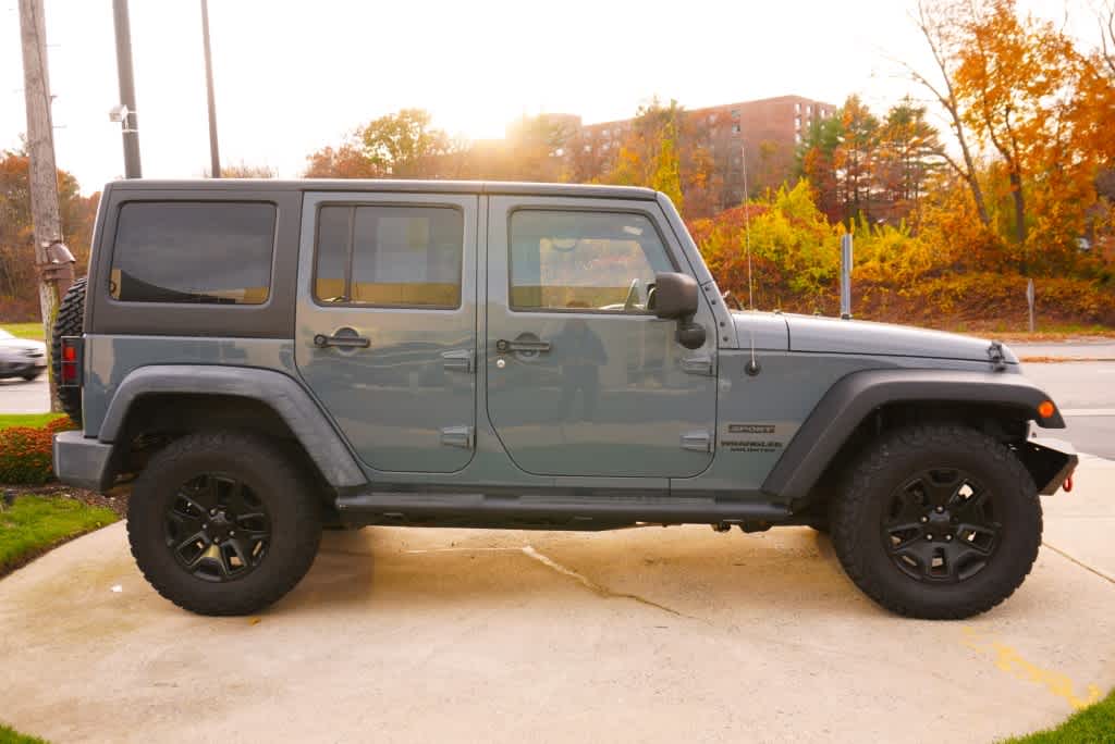 used 2014 Jeep Wrangler Unlimited car, priced at $17,998