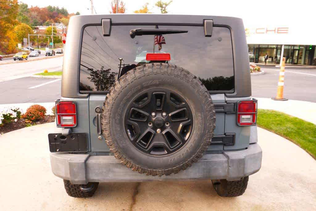 used 2014 Jeep Wrangler Unlimited car, priced at $17,998