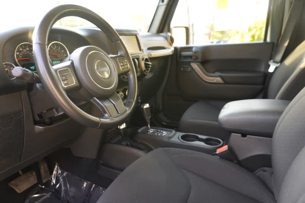 used 2015 Jeep Wrangler car, priced at $16,498