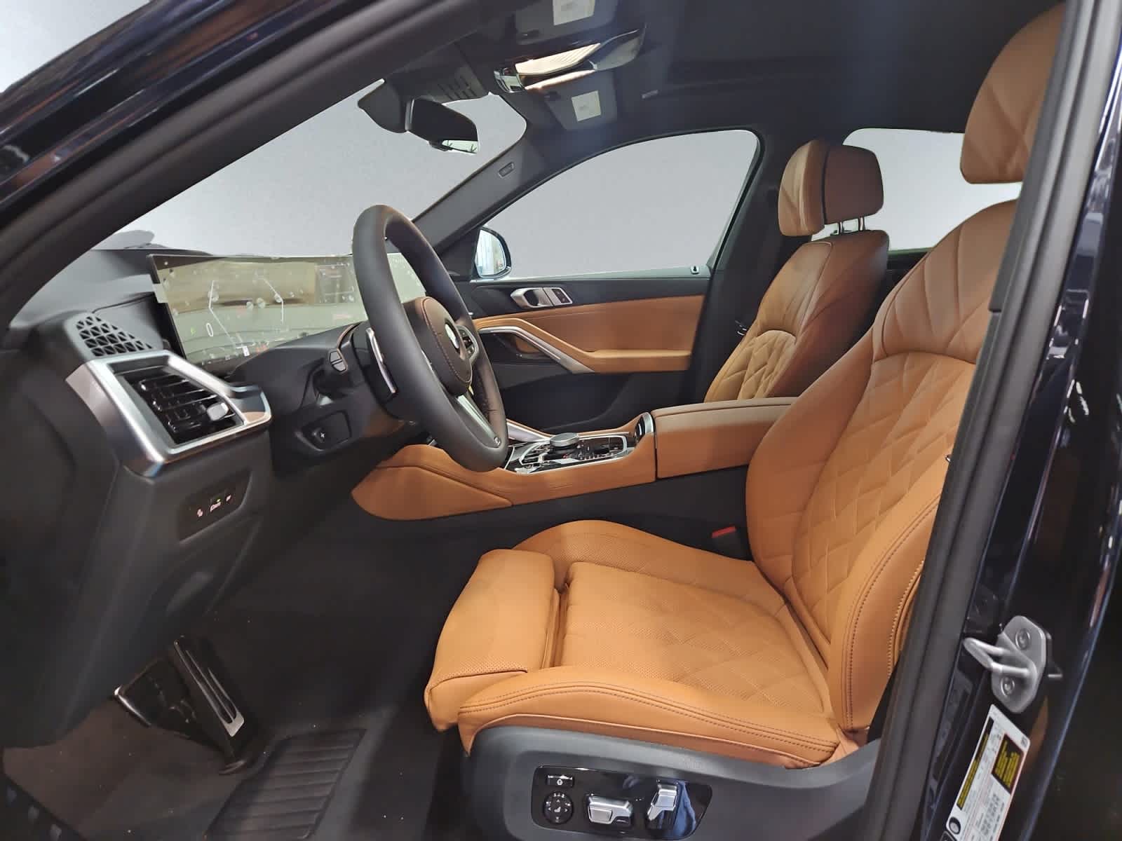 new 2025 BMW X6 car, priced at $83,285