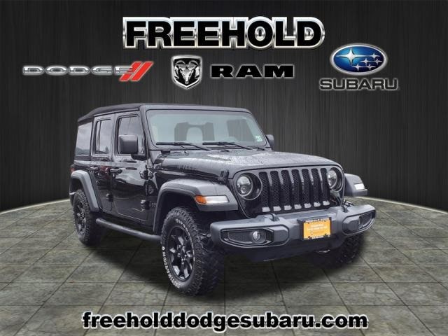 used 2021 Jeep Wrangler car, priced at $30,900