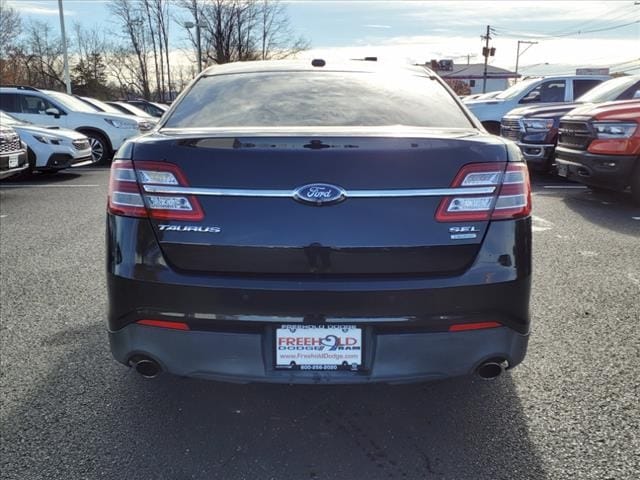 used 2015 Ford Taurus car, priced at $8,900