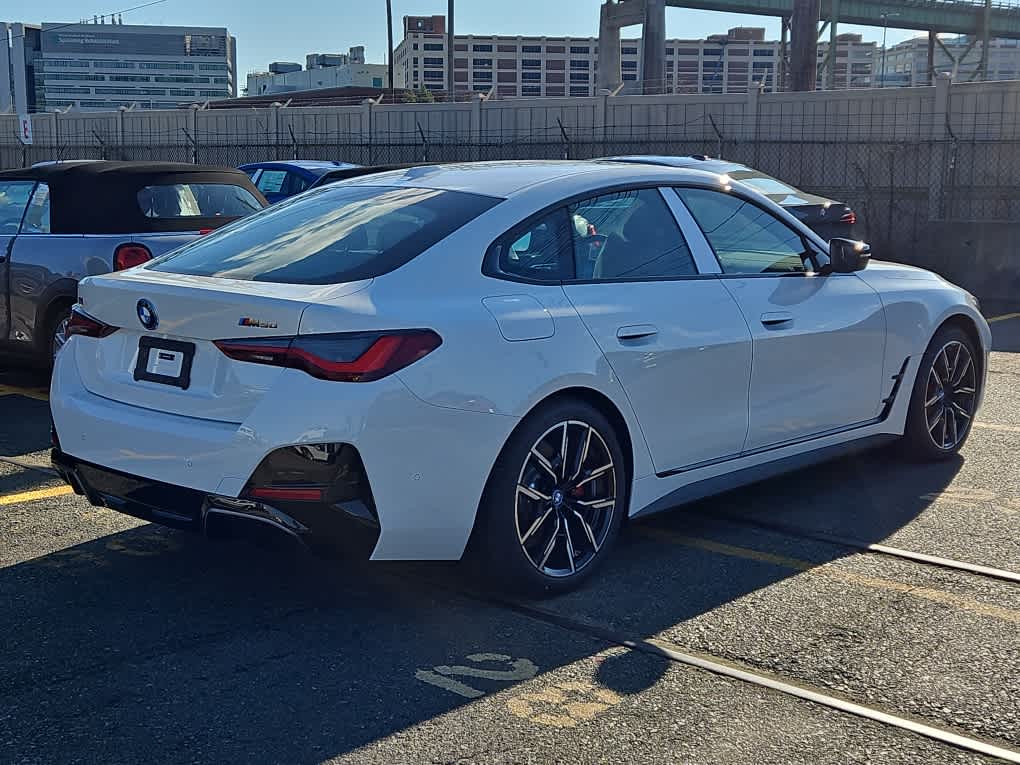 new 2024 BMW i4 car, priced at $74,590