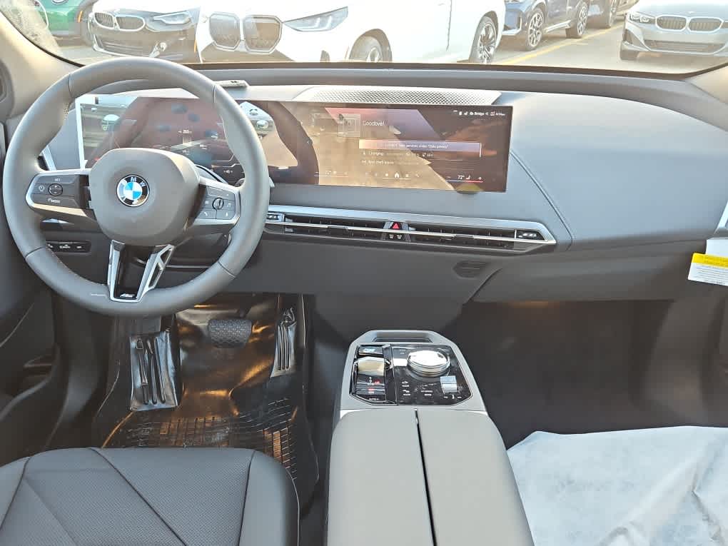 new 2025 BMW iX car, priced at $100,325