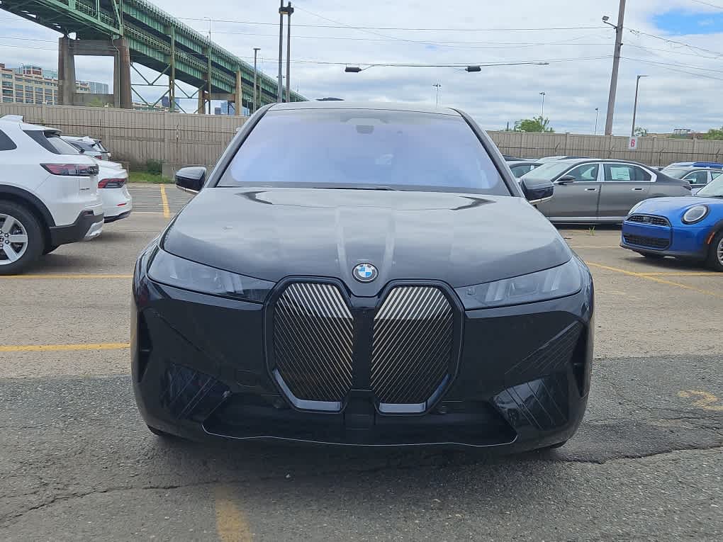 new 2026 BMW iX car, priced at $83,925
