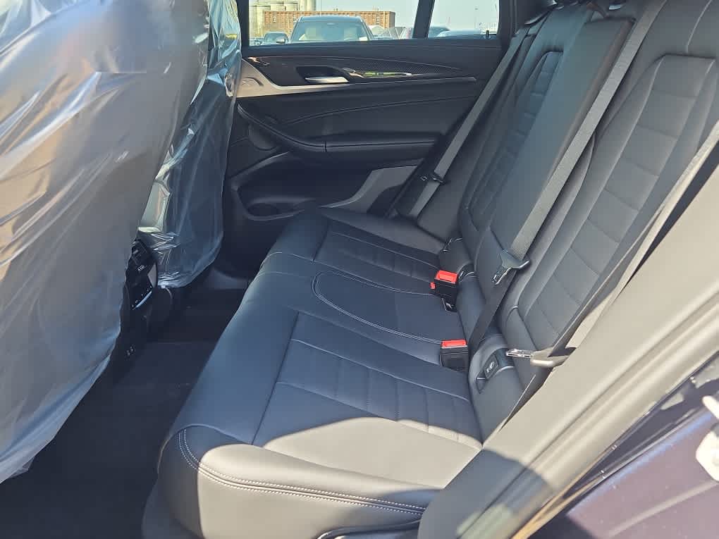 new 2025 BMW X4 M car, priced at $83,175