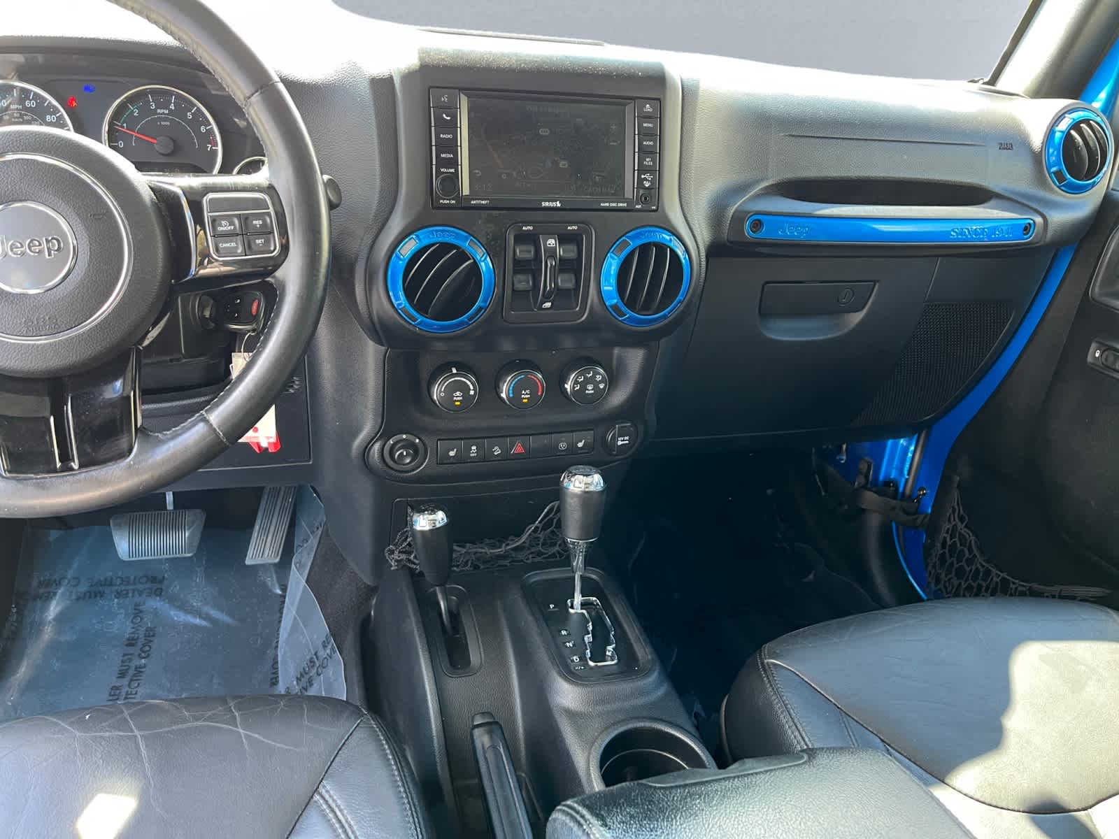 used 2015 Jeep Wrangler Unlimited car, priced at $19,868