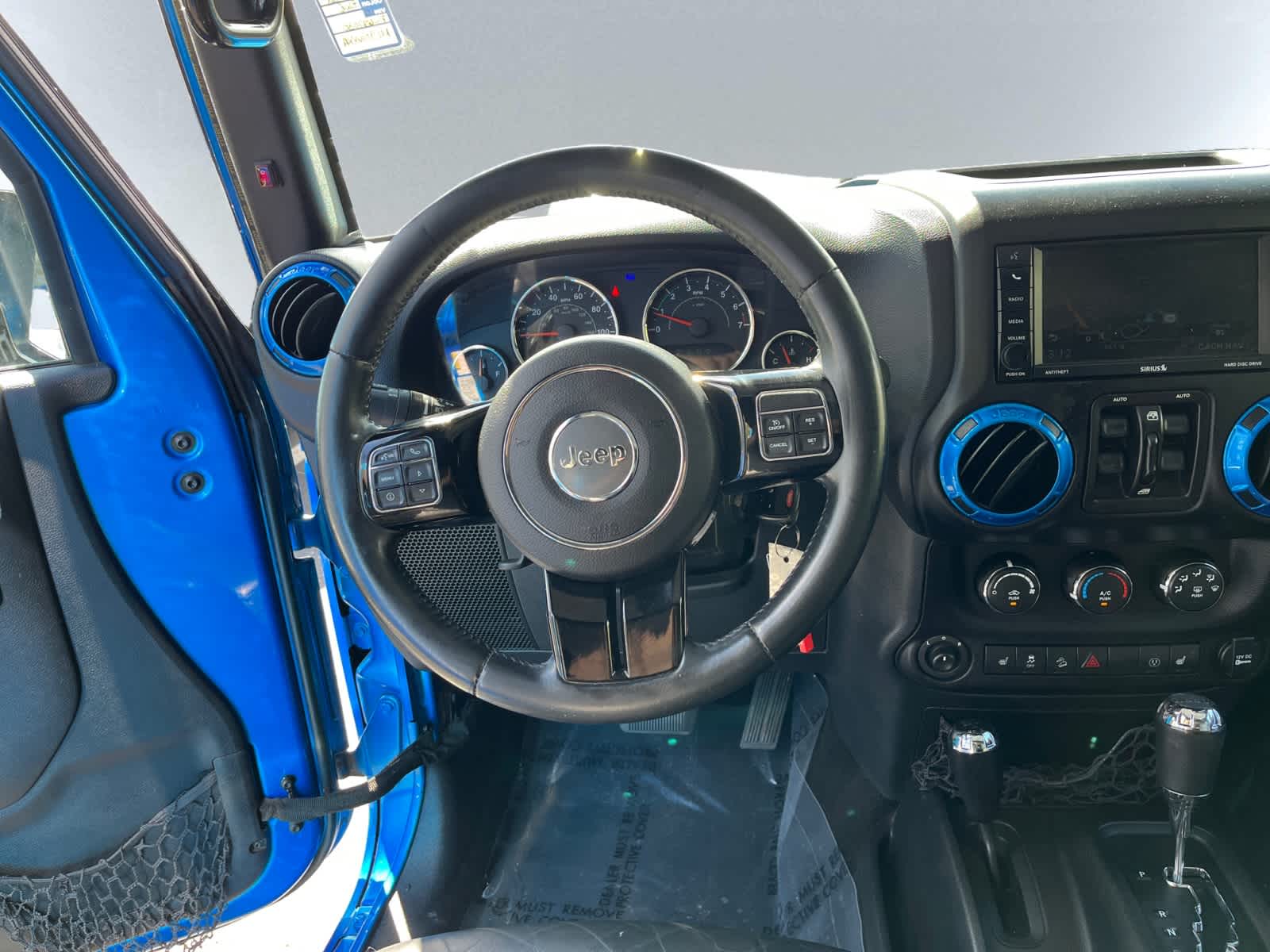 used 2015 Jeep Wrangler Unlimited car, priced at $19,868