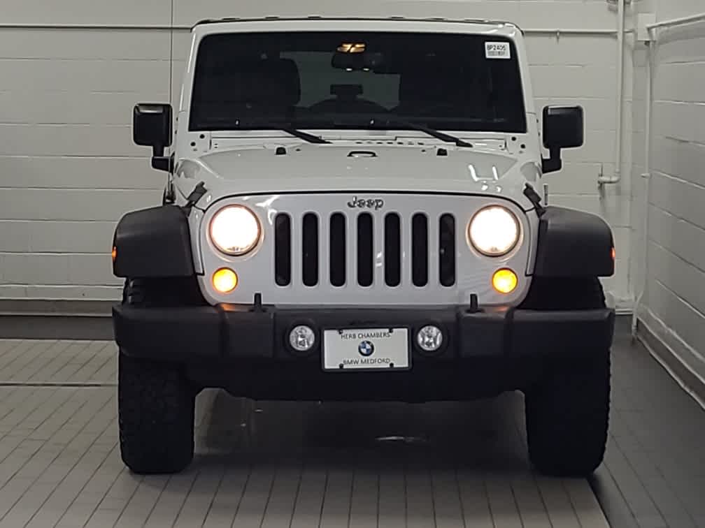 used 2015 Jeep Wrangler Unlimited car, priced at $15,688