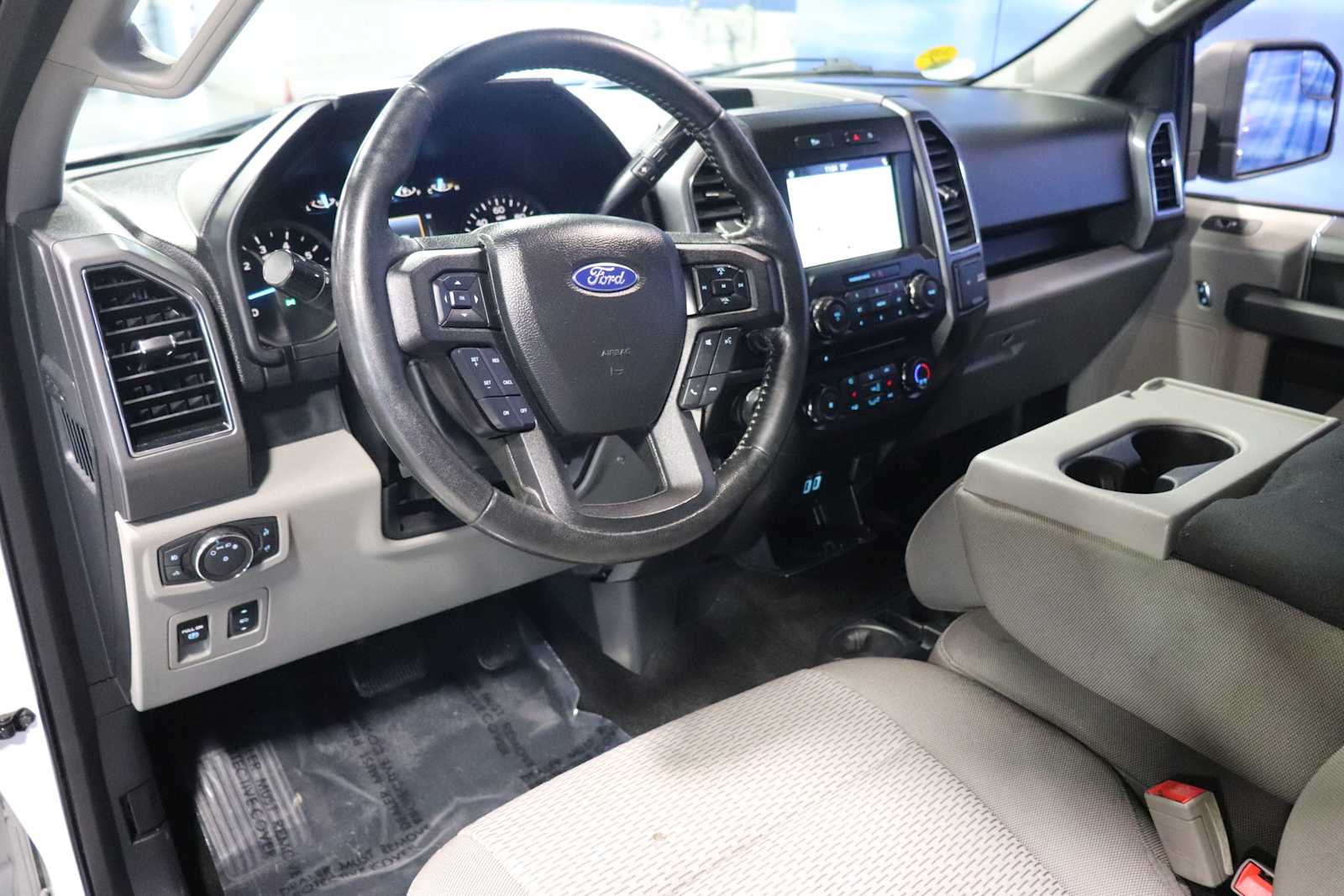 used 2018 Ford F-150 car, priced at $13,498