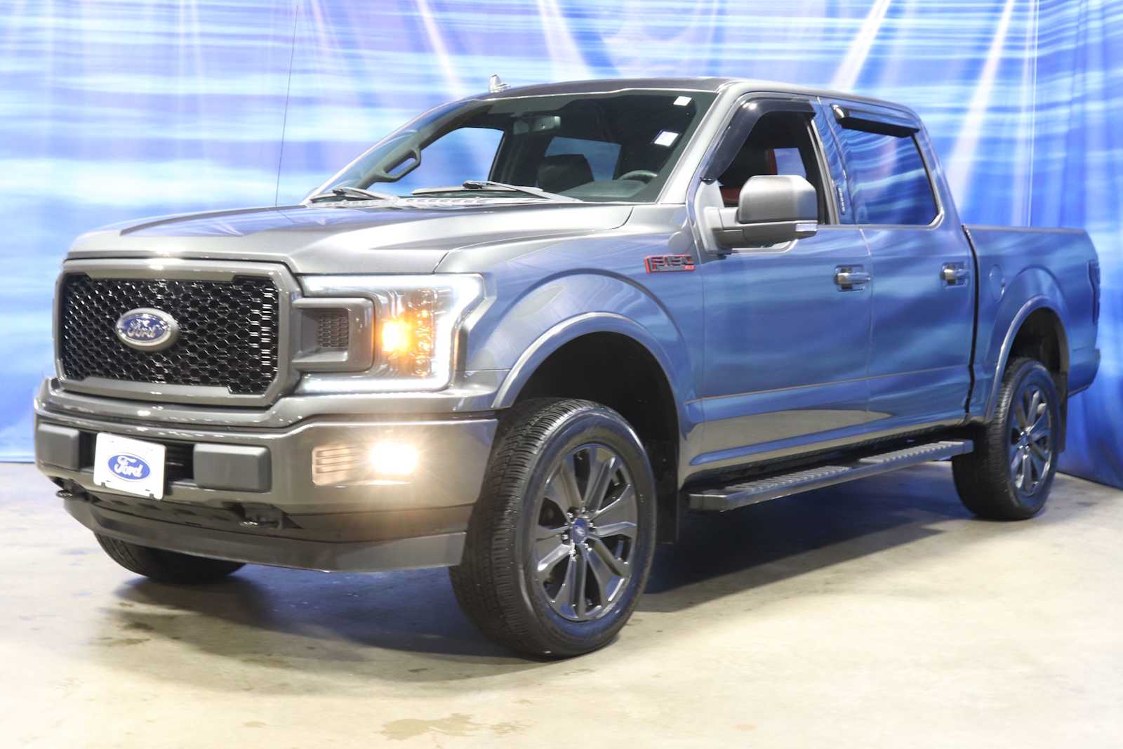 used 2018 Ford F-150 car, priced at $30,988