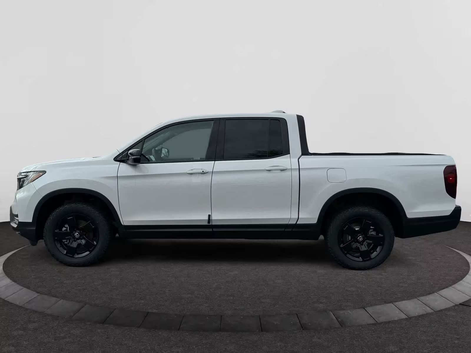 used 2025 Honda Ridgeline car, priced at $44,998