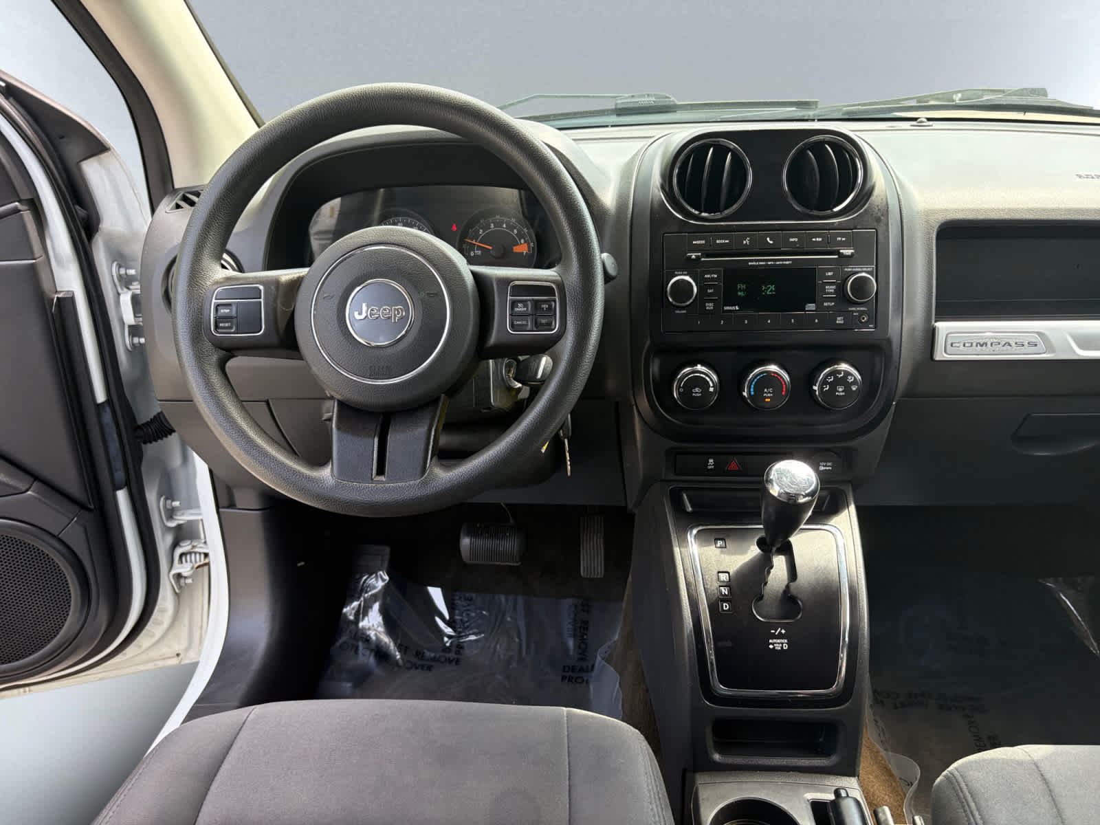 used 2016 Jeep Compass car, priced at $9,998
