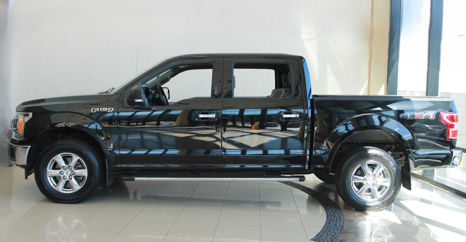 used 2018 Ford F-150 car, priced at $26,998