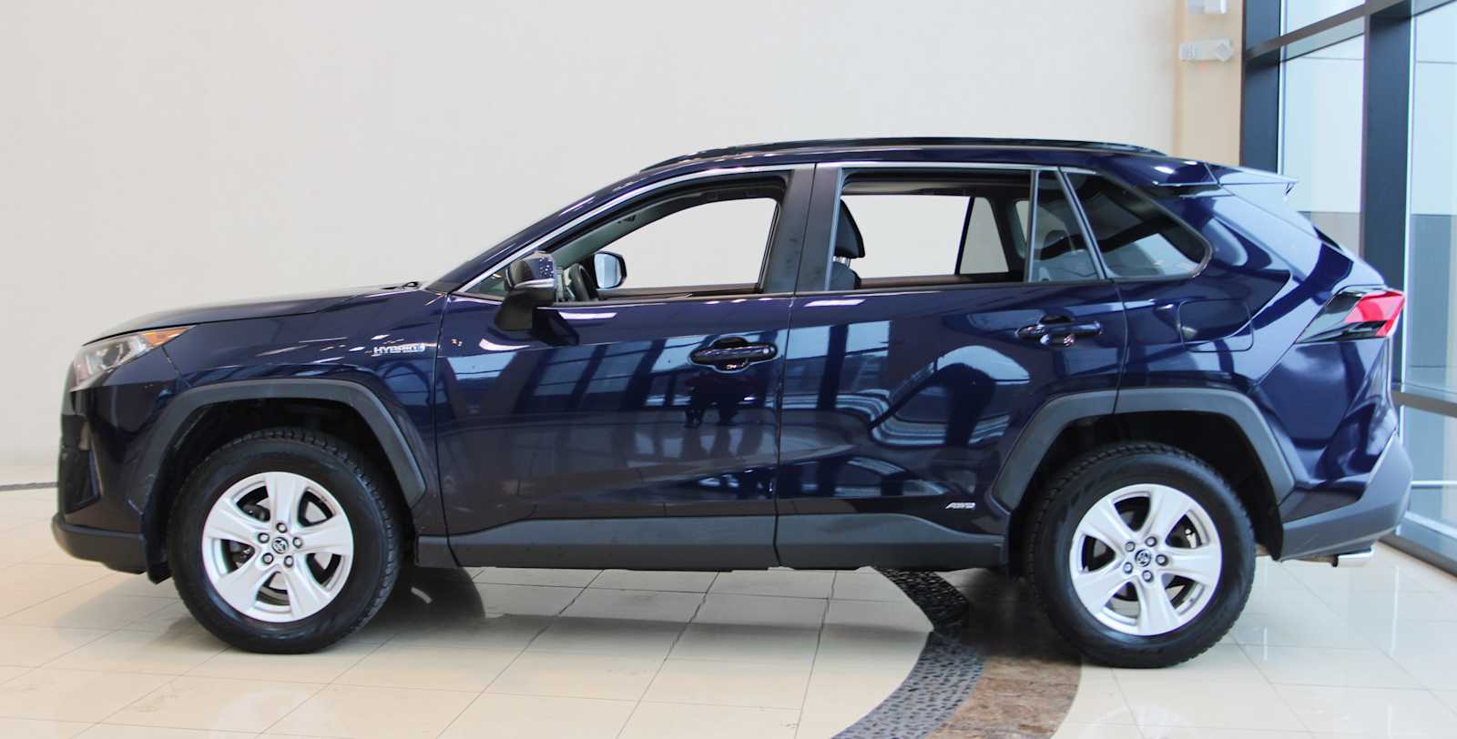 used 2019 Toyota RAV4 Hybrid car, priced at $24,398