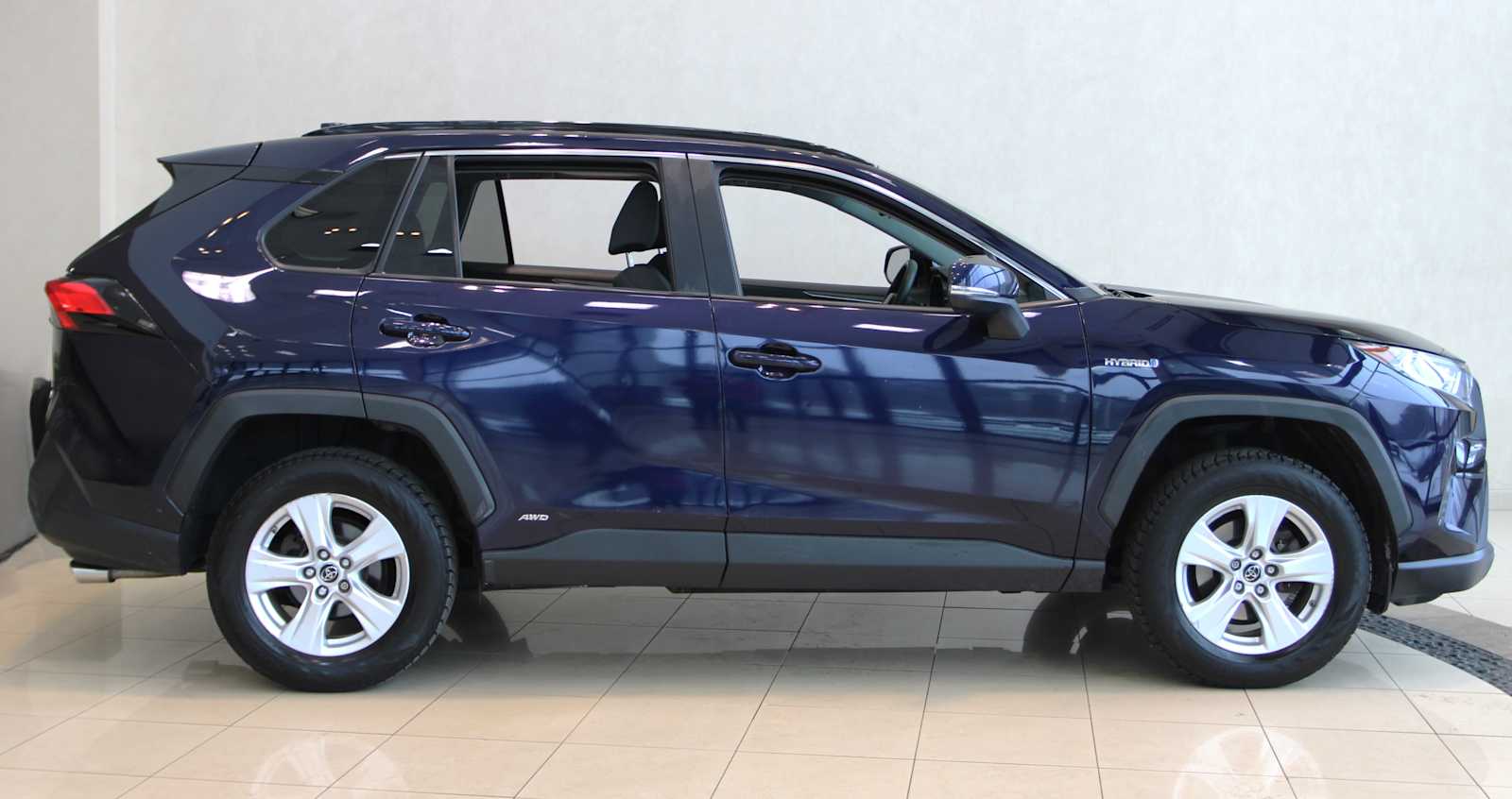 used 2019 Toyota RAV4 Hybrid car, priced at $24,398