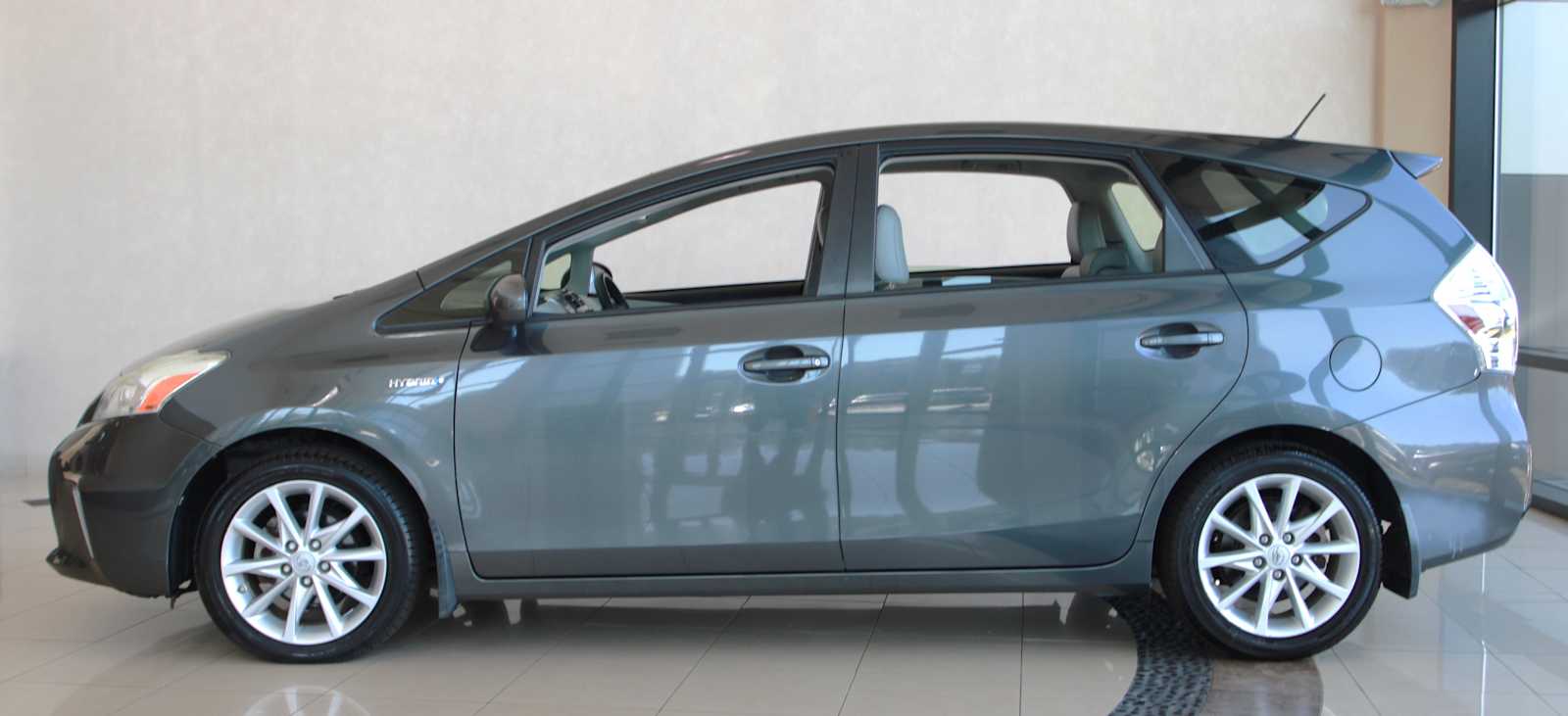 used 2014 Toyota Prius v car, priced at $13,998