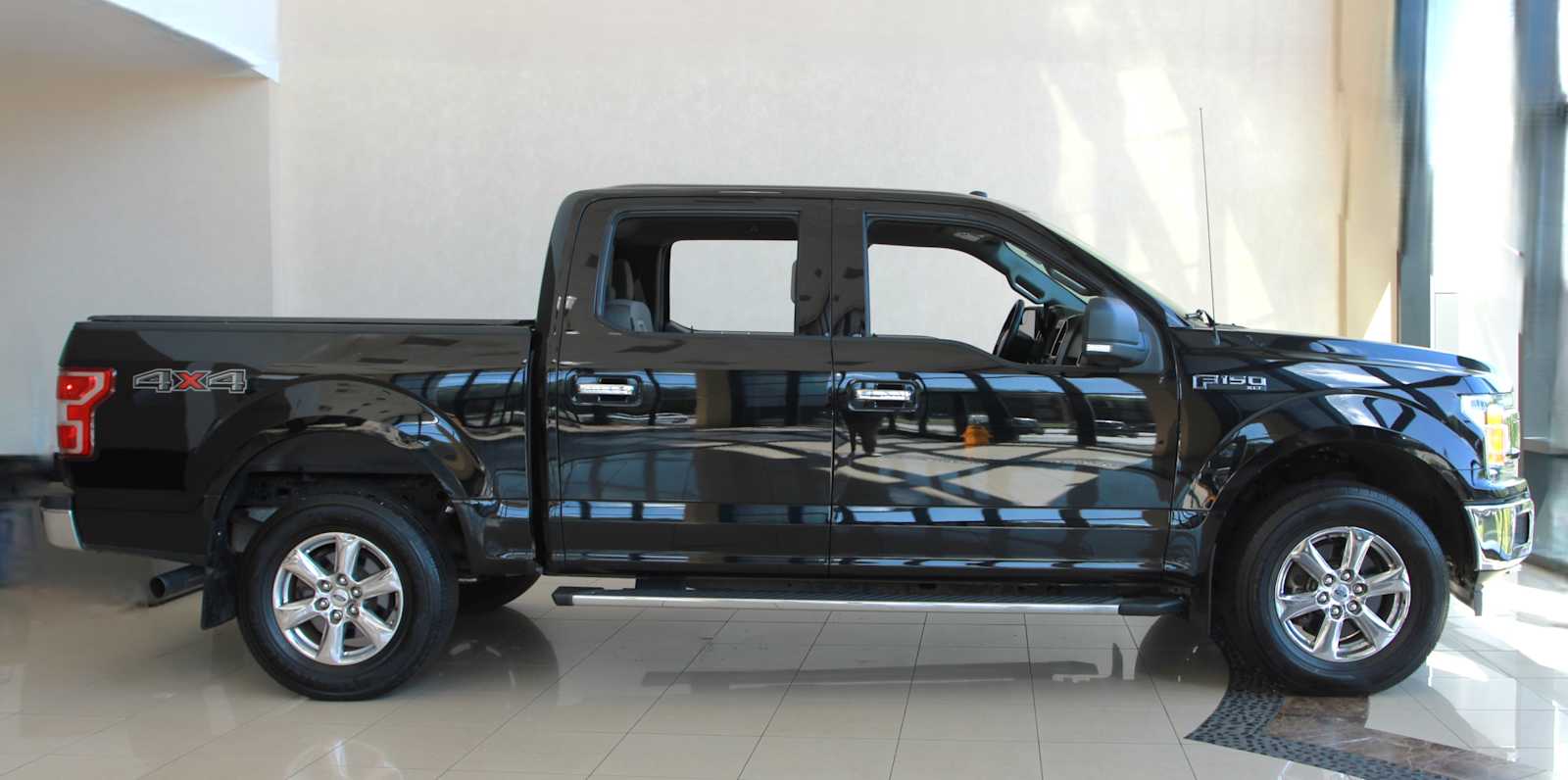 used 2018 Ford F-150 car, priced at $26,998