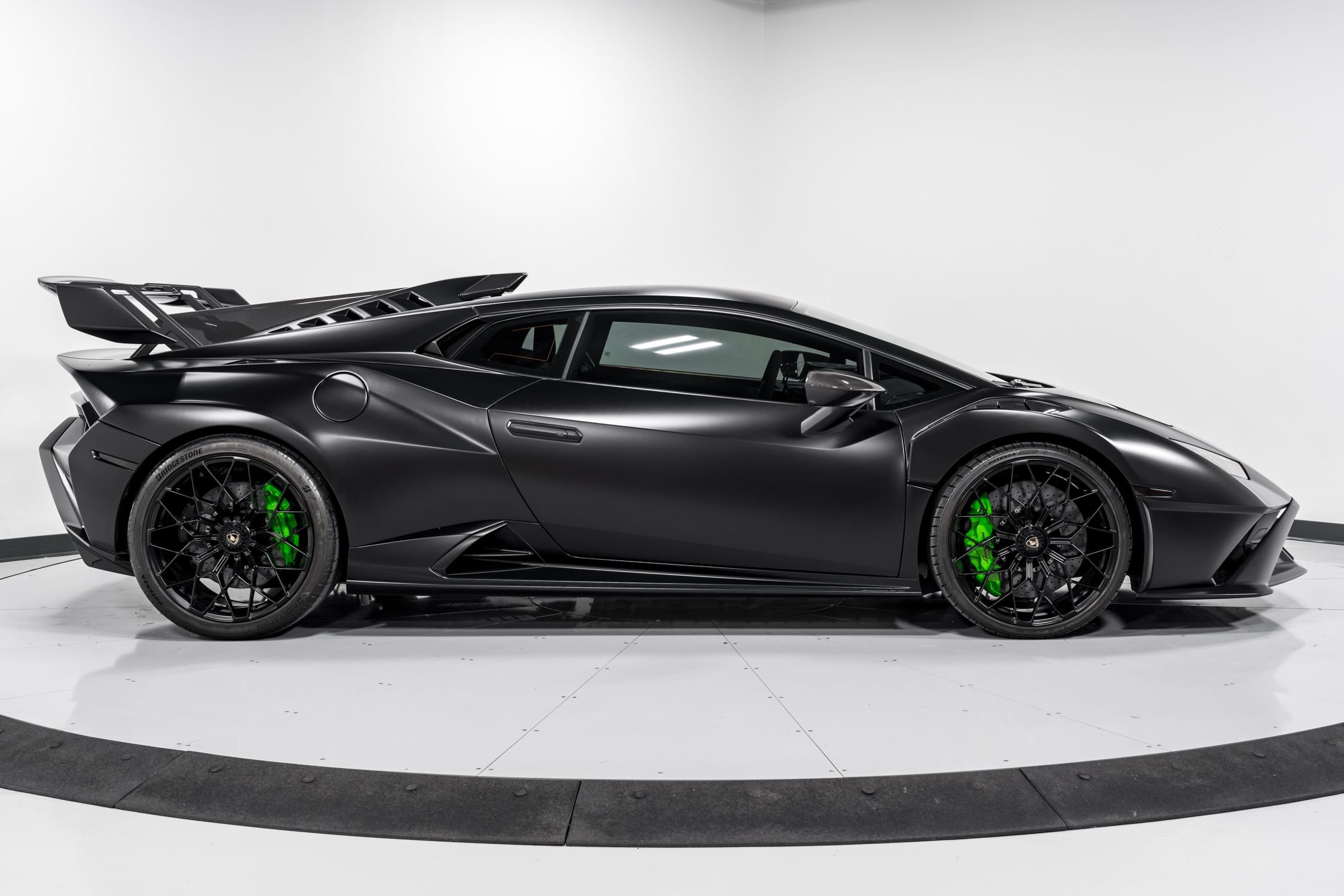 used 2023 Lamborghini Huracan STO car, priced at $399,999