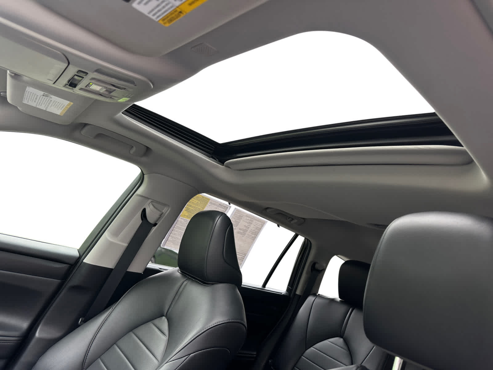 used 2020 Toyota Highlander Hybrid car, priced at $26,998