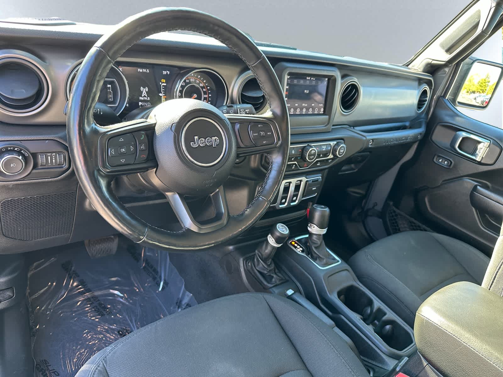 used 2021 Jeep Wrangler car, priced at $27,498