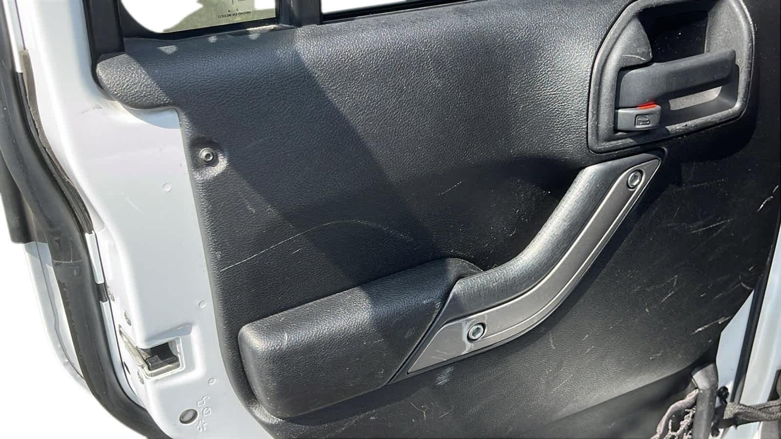 used 2013 Jeep Wrangler Unlimited car, priced at $12,492