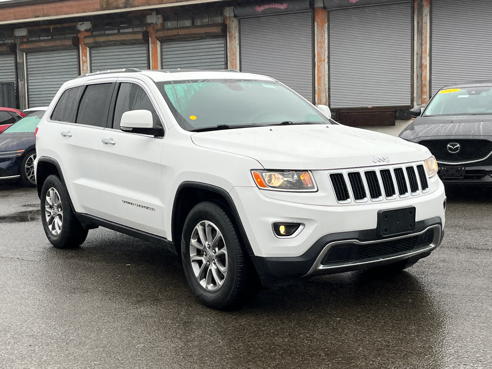 used 2014 Jeep Grand Cherokee car, priced at $13,944