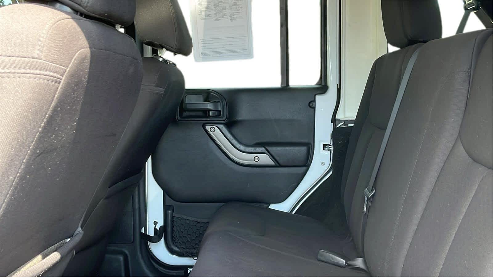 used 2013 Jeep Wrangler Unlimited car, priced at $12,492
