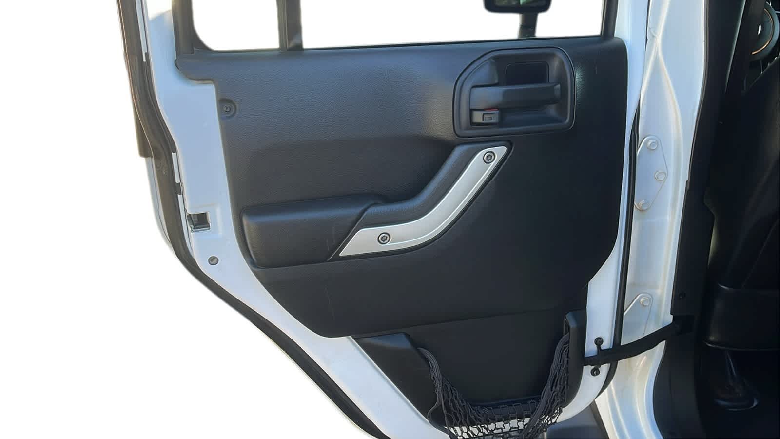 used 2014 Jeep Wrangler Unlimited car, priced at $15,942