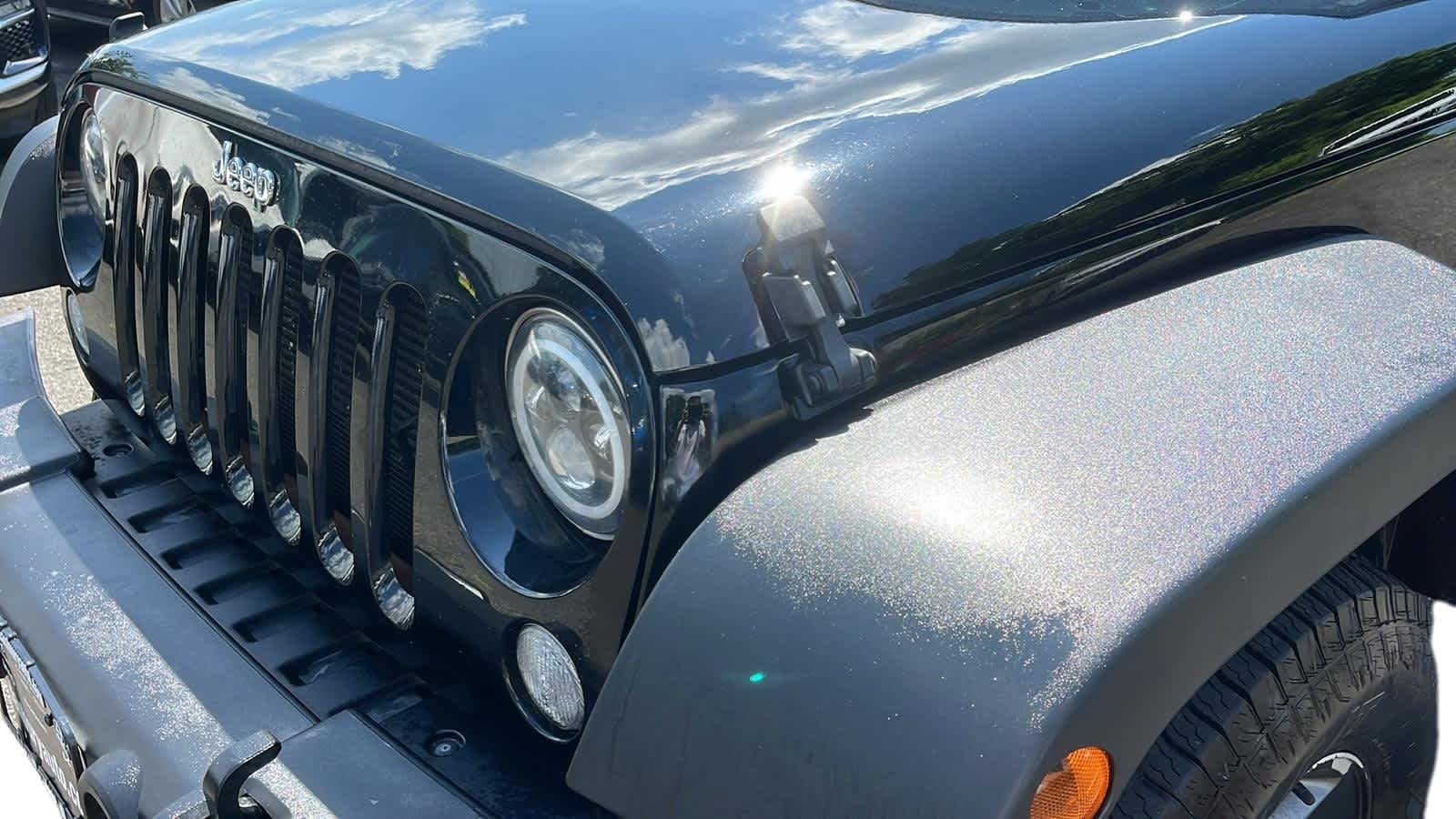 used 2016 Jeep Wrangler Unlimited car, priced at $15,887