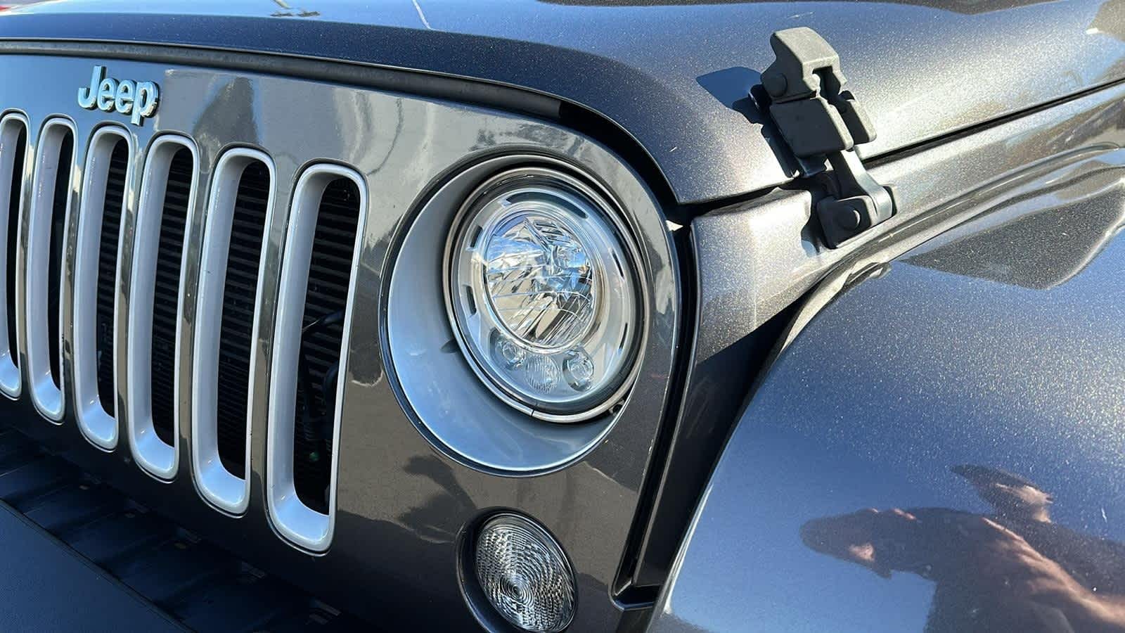 used 2018 Jeep Wrangler Unlimited car, priced at $23,794