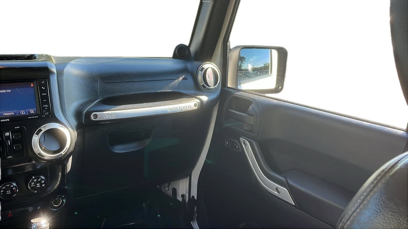used 2014 Jeep Wrangler Unlimited car, priced at $15,942