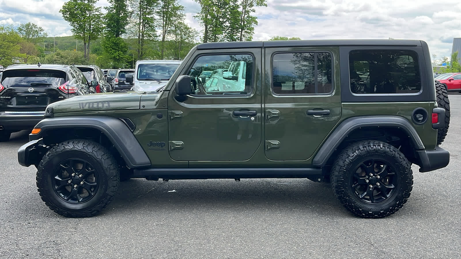 used 2021 Jeep Wrangler car, priced at $25,618