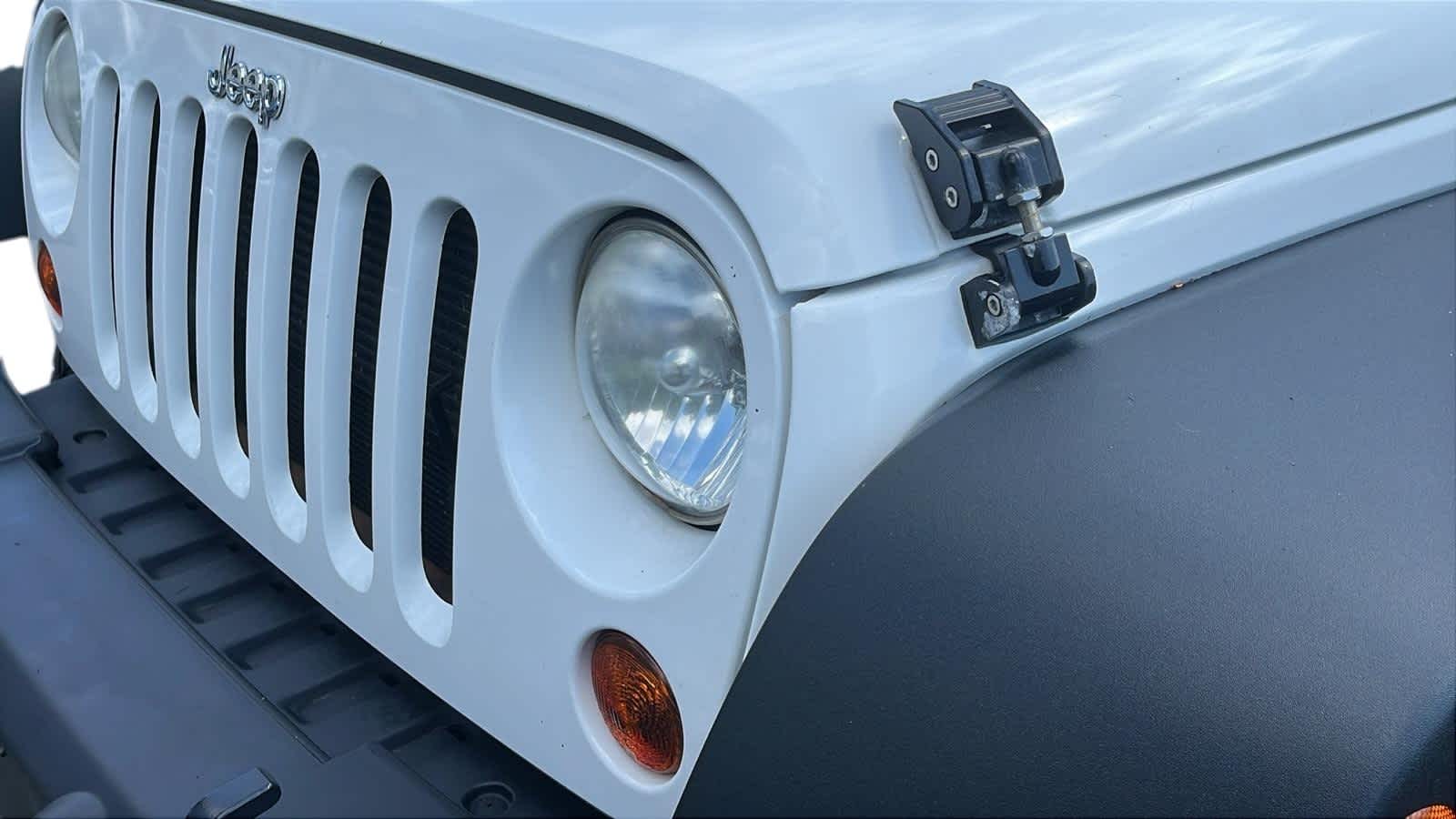 used 2013 Jeep Wrangler Unlimited car, priced at $12,492
