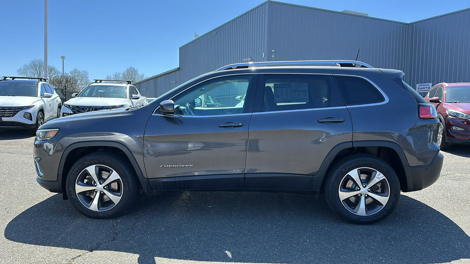 used 2021 Jeep Cherokee car, priced at $21,903