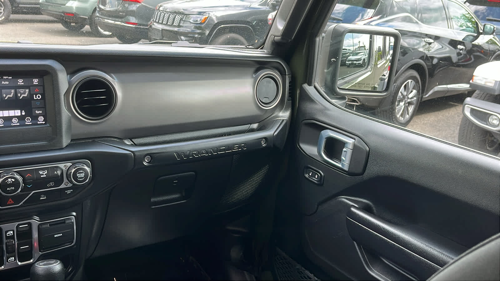used 2021 Jeep Wrangler car, priced at $25,618