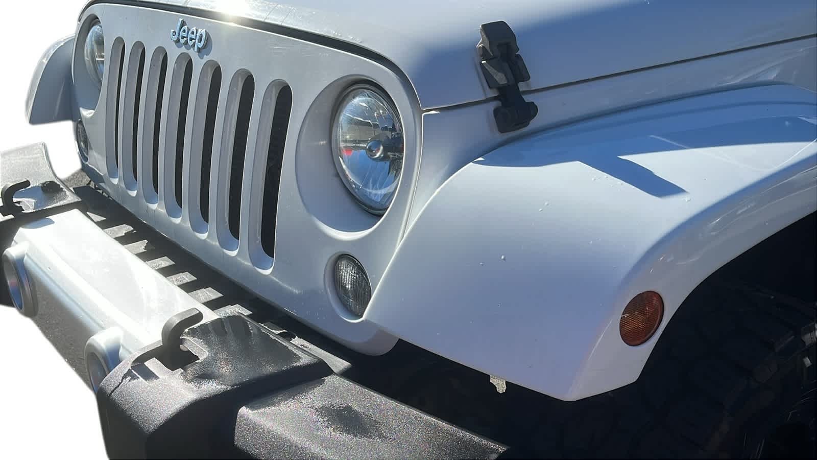 used 2014 Jeep Wrangler Unlimited car, priced at $15,942