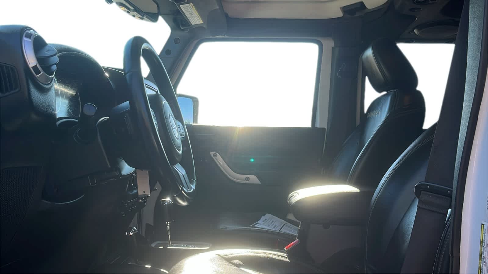 used 2014 Jeep Wrangler Unlimited car, priced at $15,942